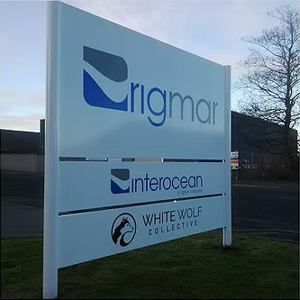 Exterior totem sign at an industrial site